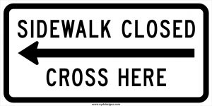 sidewalk closed cross here left arrow sign for sidewalk sheds and construction detours